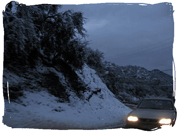 Car on a cold mountain road.