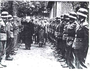 A picture taken in 1943 of the Grand Mufti of Jerusalem Haj Amin el-Husseini reviewing Bosnian-Muslim troops - a unit of the 'Hanjar (Saber) Division' of the Waffen SS which he personally recruited for Hitler.